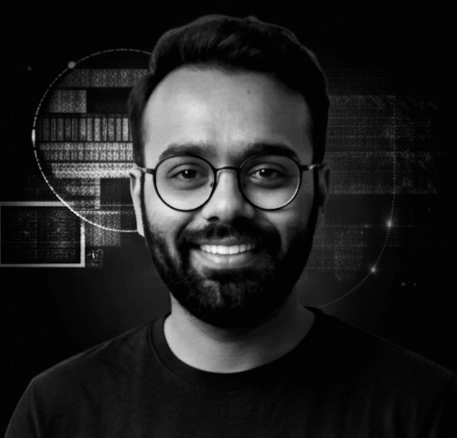Close-up portrait of a professional engineer in a high-contrast black and white aesthetic with dramatic technical lighting